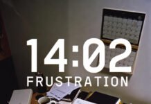 Lead Generation Metrics You Must Be Monitoring Chaotic desk piled with papers, coffee, and laptop at 2 p.m. frustration