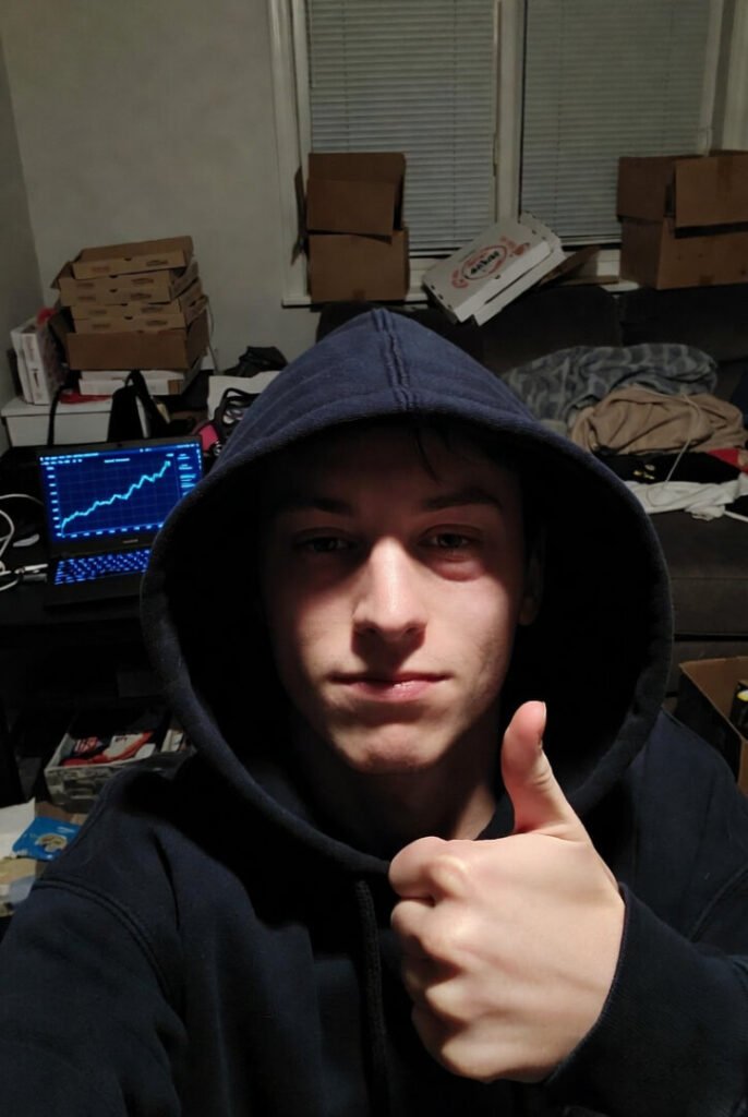 Frustrated 2 a.m. phone photo: Facebook ad learning limited notice + crude red sad face doodle.